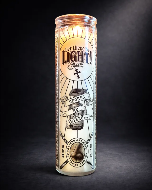 Dramatic, dark-background product photography of a clean/all-natural 12 oz 100% soy wax prayer candle made without fragrance oils.
