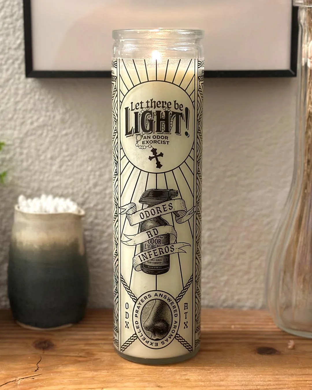 A 12 oz 100% soy wax natural, fragrance-free candle burning.