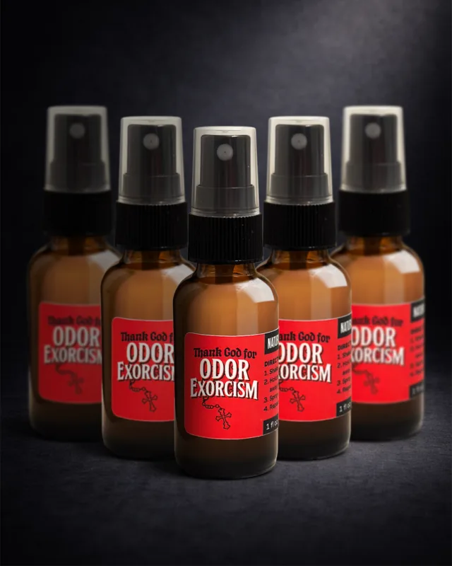 Dramatic, dark-background product photography of Odor Exorcism’s travel-size 1 oz odor eliminator 5-pack.